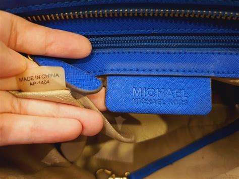 how to tell real mk purse|michael kors purses serial number.